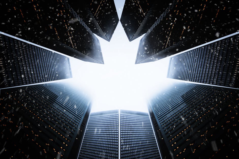 A striking low angle view of skyscrapers forming a maple leaf shape against the sky.