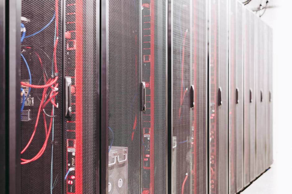 Modern data server room with network racks and cables.